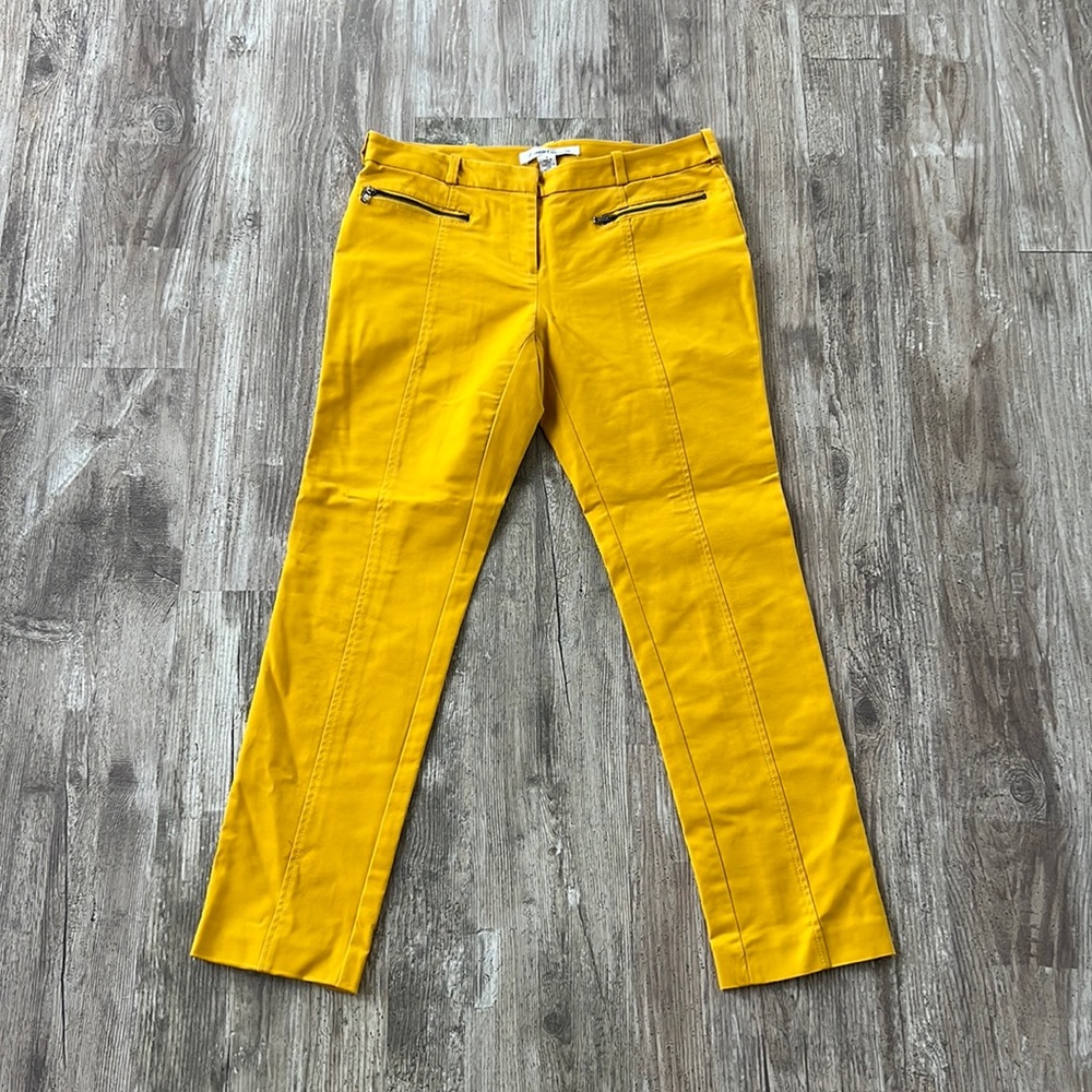 Kenneth Cole size 4 dress pant in marigold. Front pockets zip. Mint condition